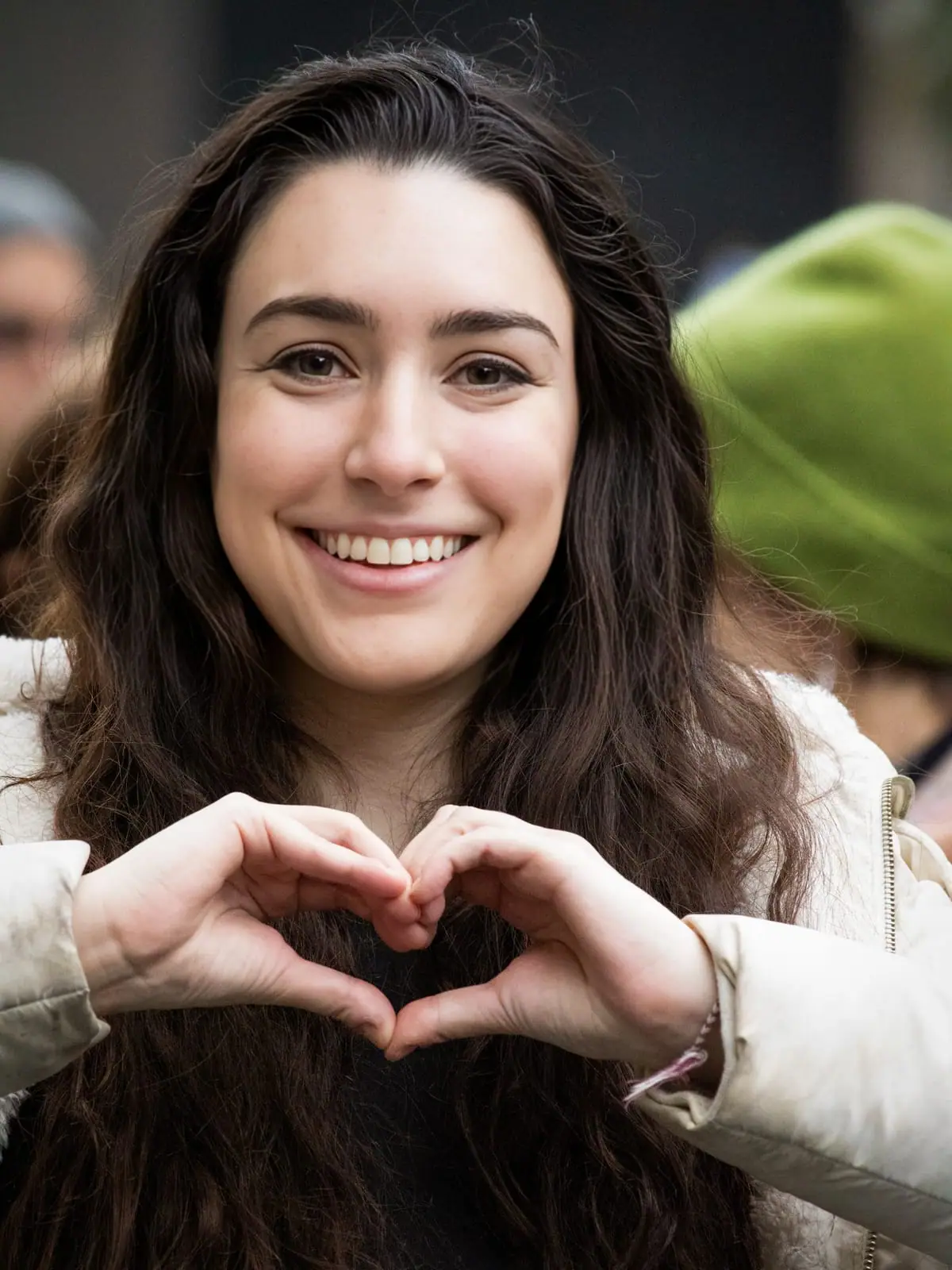 Hands forming a heart, warm gesture