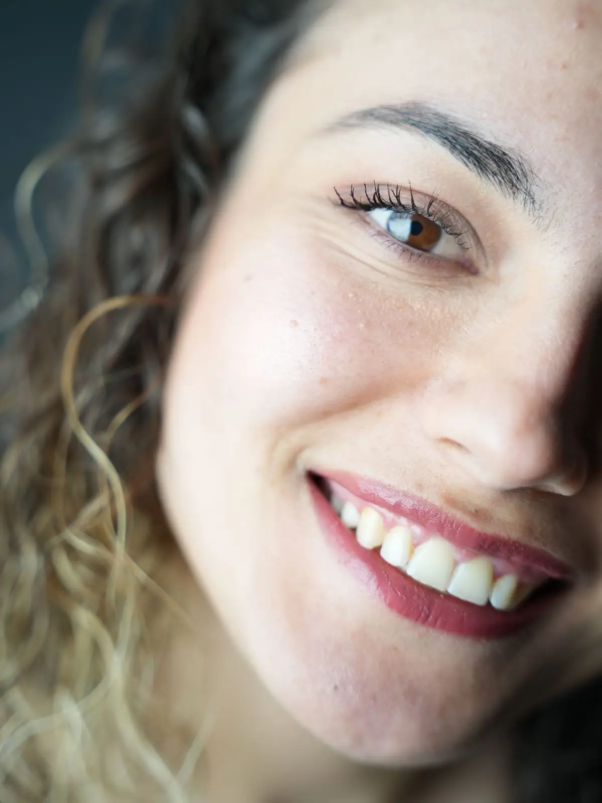 A warm, close smile